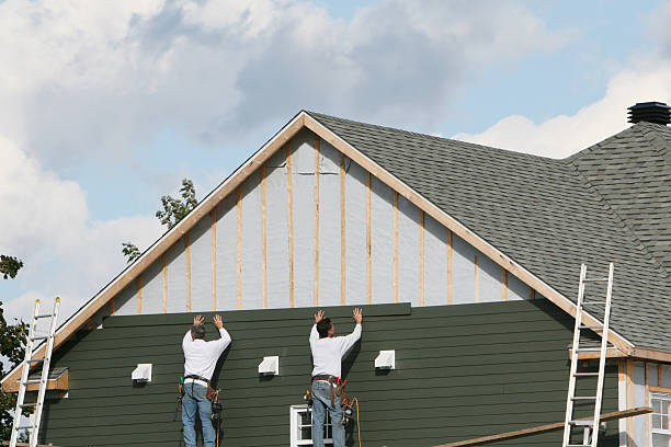 Professional Siding Contractor technician working in Nunn, CO